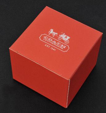 กล่องใส่ขนม COACH เพื่อใส่ขนมสำหรับมอบให้ลูกค้าในงานเปิดตัวสินค้าใหม่