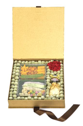 Cardboard box wrapped in Thai dessert, Thai basil and chalky inside decorated with colorful flowers.